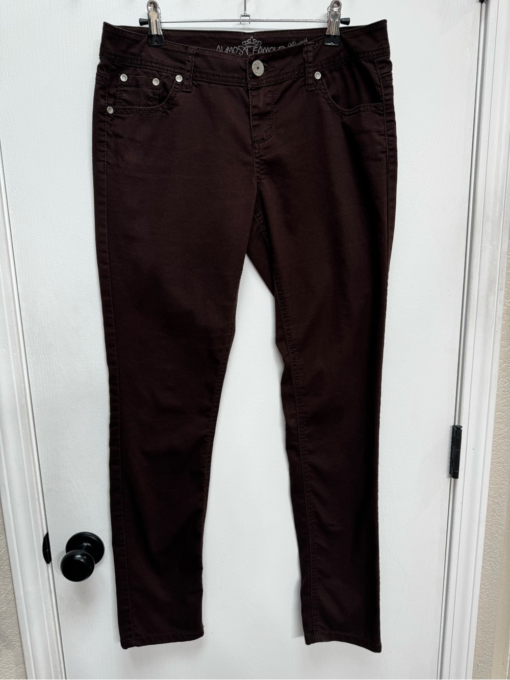 Almost Famous Brown Low-Rise Jeans with Pink Zip Accent